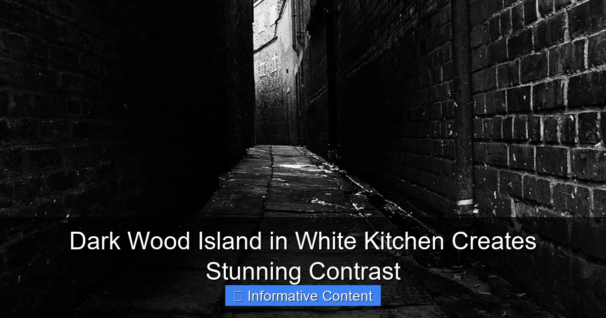 Dark Wood Island in White Kitchen Creates Stunning Contrast